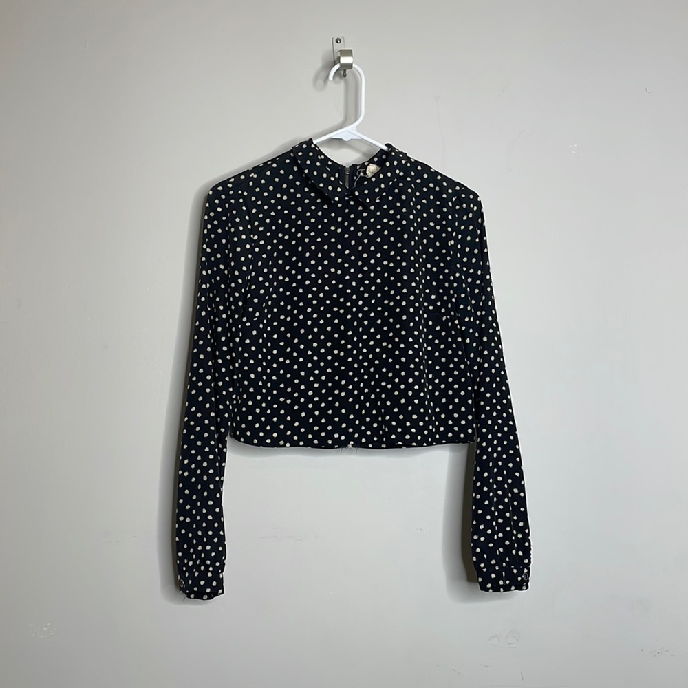 Blouse with small collar detail. Excellent condition.